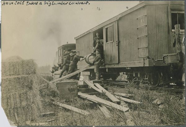 Hugh Cole takes a lumber contract. Offloading supplies for a logging camp around 1908 somewhere around Badger or Millertown. (Provincial Archives of NL)